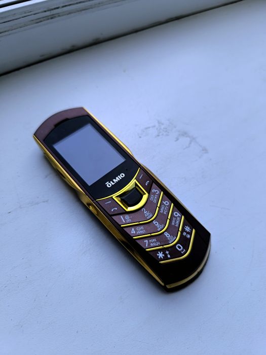 Продам Мобильный телефон Olmio K09 Золото