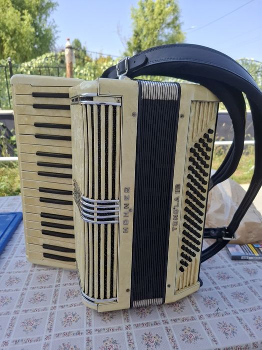 Vind acordeon hohner bijuterie