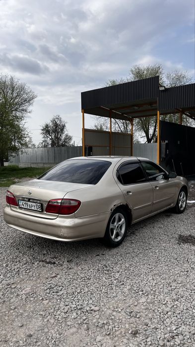 Машина ниссан цефиро а33