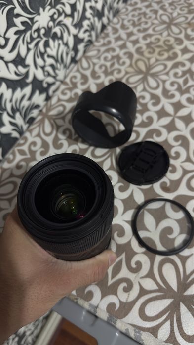 Sigma 35 mm 1.4 art full касестве