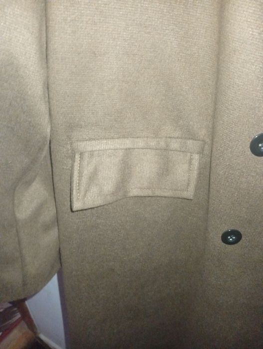 Palto yangi kiyilmagan etketka bilan