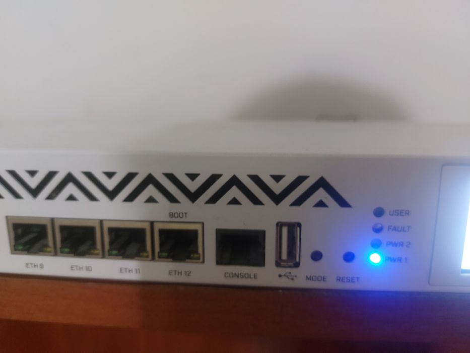 Маршрутизатор Mikrotik Cloud Core Router 1036-12G-4S