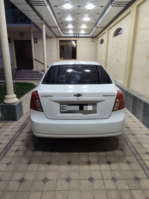 Lacetti 1.8 бир қўл мошина