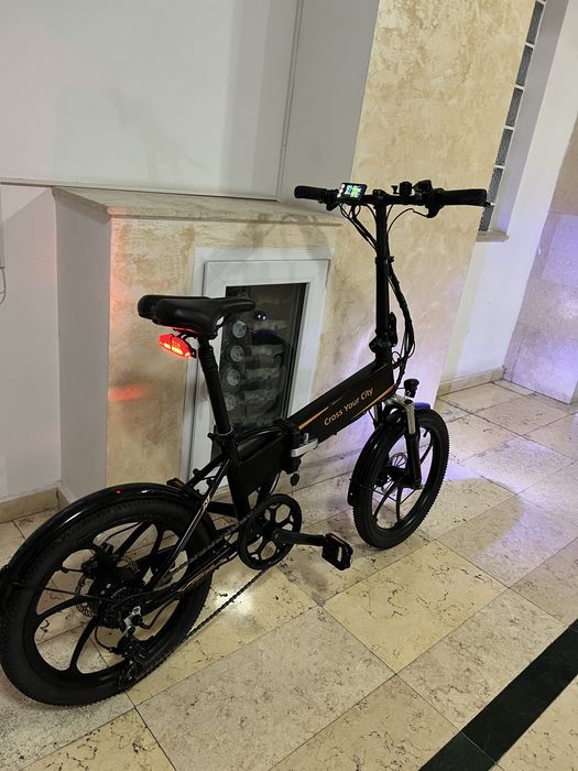Bicicleta electrica pliabila ,  asistata ADO cu frane hidraulice