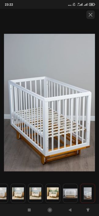 Детская кроватка с маятником