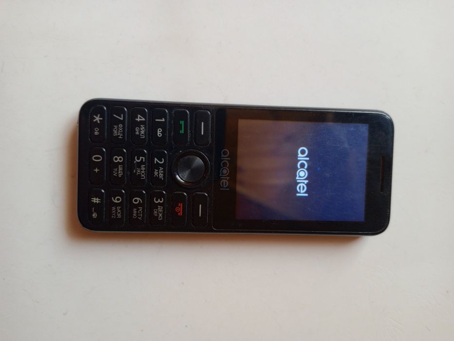 Телефон с копчета / бутони Alcatel и зарядно