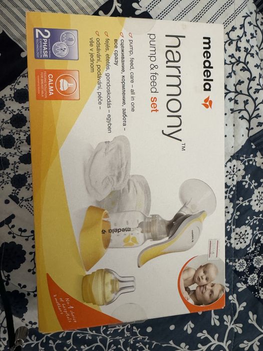 Молокоотсос Medela