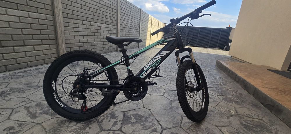 Bicicletă copii 7-10 ani