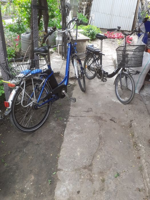 Bicicletă electrică asistată de firmă utilaje