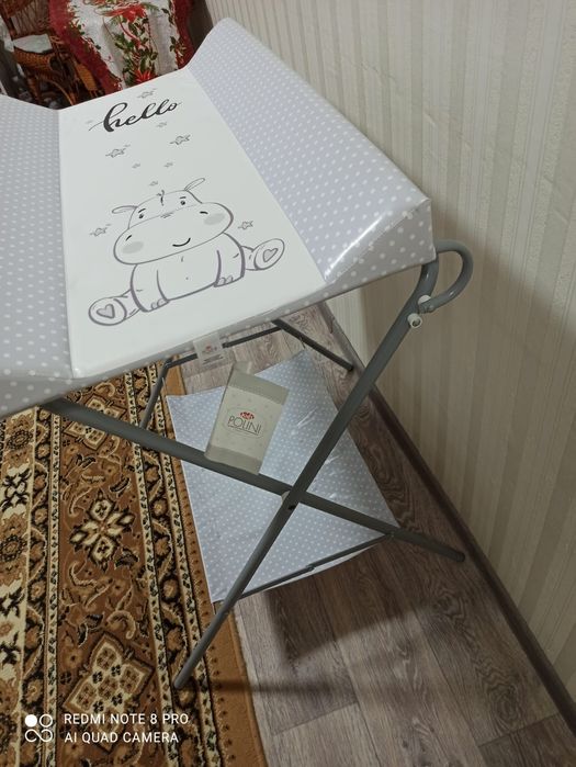 Пеленальный стол