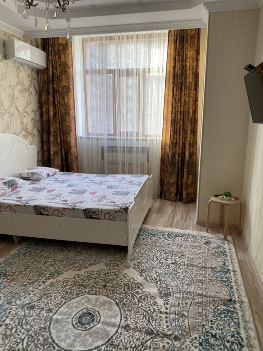 Кровать и ковер