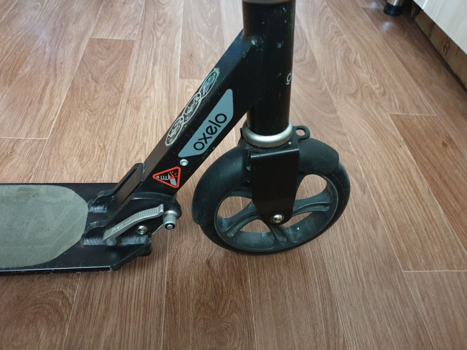 Продам самокат б/у фирменный Oxelo mid 7.