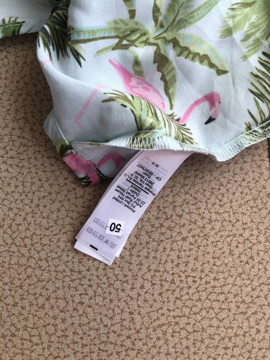 Плажен гащеризон с V-образно деколте и гол гръб