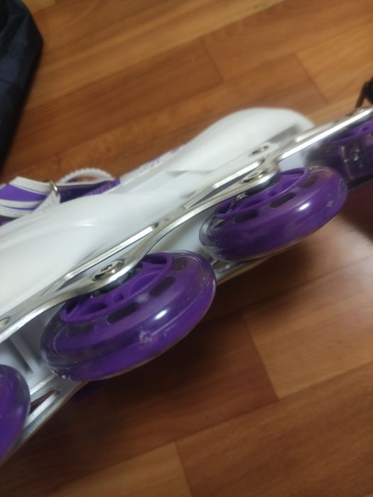 Роликовые коньки