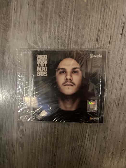 cd guess who tot mai sus