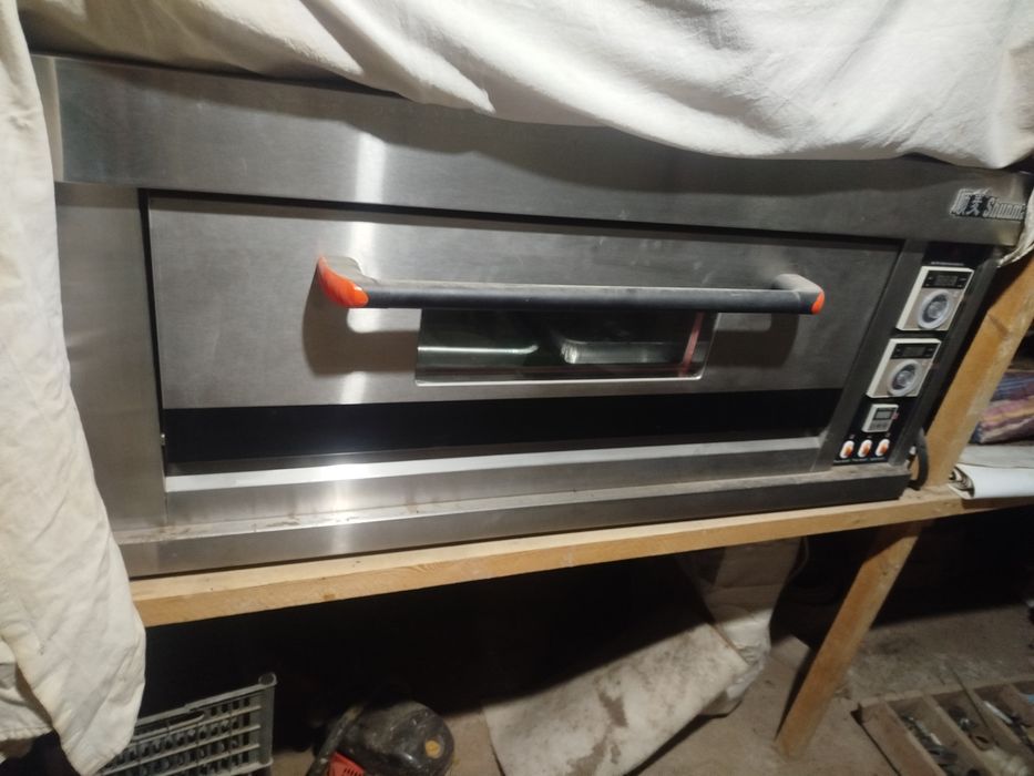 миксер ва буханка и печения учун печка сотилади ишлатилмаган тоза