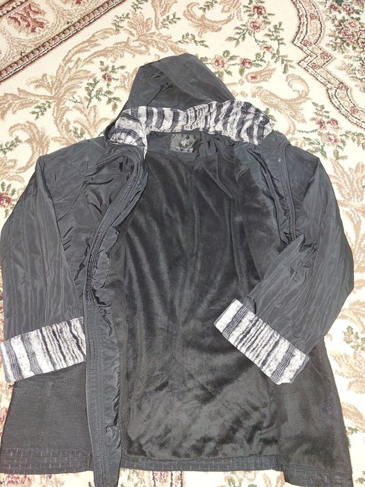 Женская куртка в отличном состоянии.