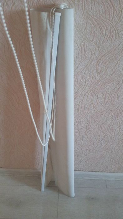 Штора жалюзи на балконое окно