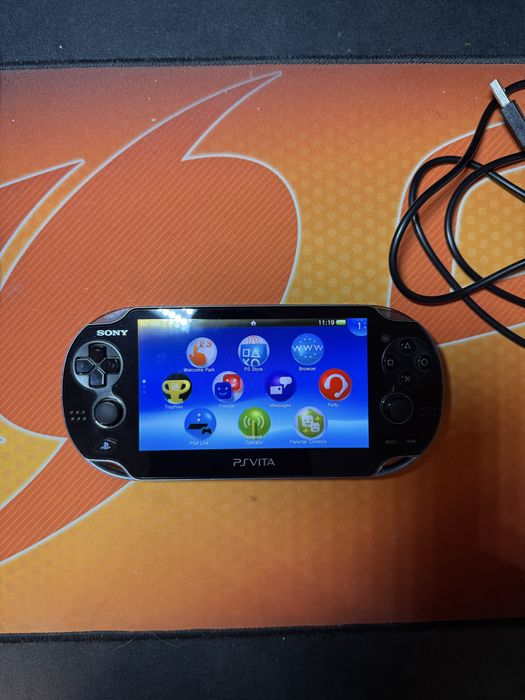 Ps Vita 1104 OLED 16GB, 7 игри, калъф, зарядно и адаптер за карта памет