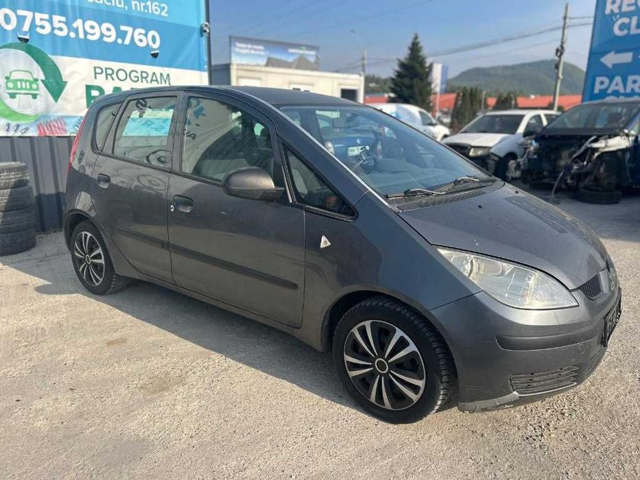 Dezmembrez Mitsubishi Colt 1.3i 2005 135.930