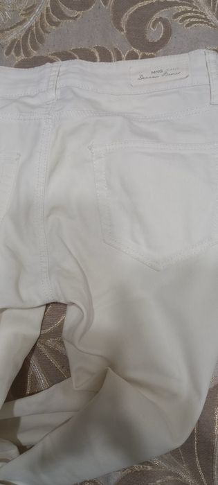 Женские джинсы брюки