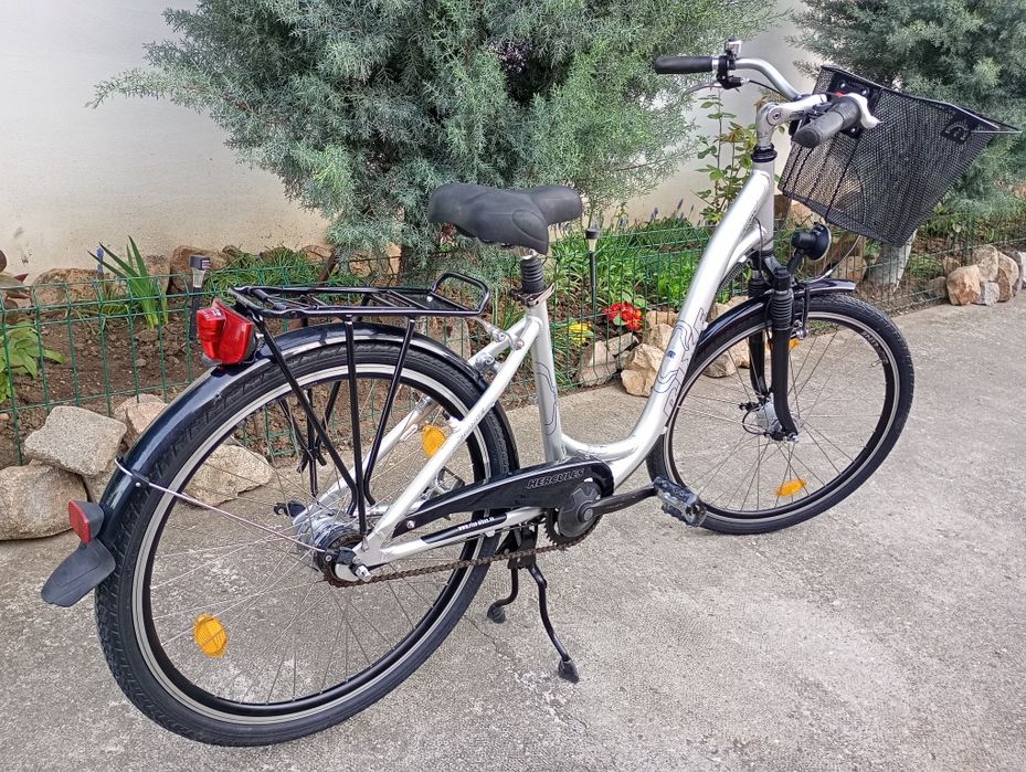 Vand bicicletă damă RIXIE,roți 26,cu 7 vit butuc Nexus !