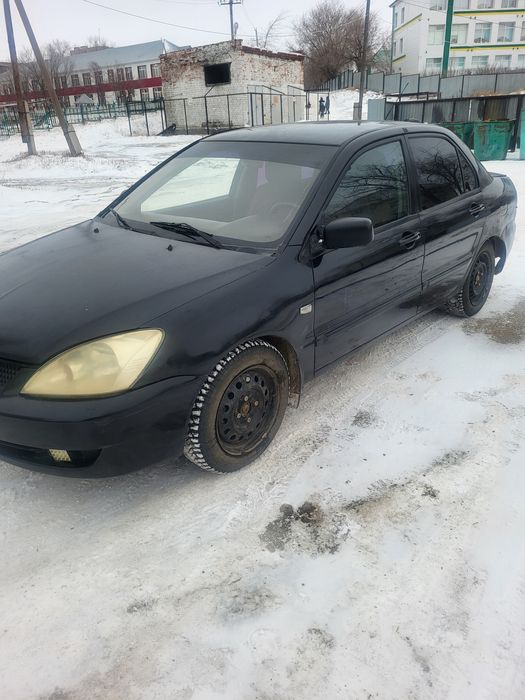 Митсубиси лансер9 2009год