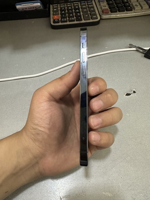 Iphone 12 pro holat idyal  arqa krshkan uzalmashkan
