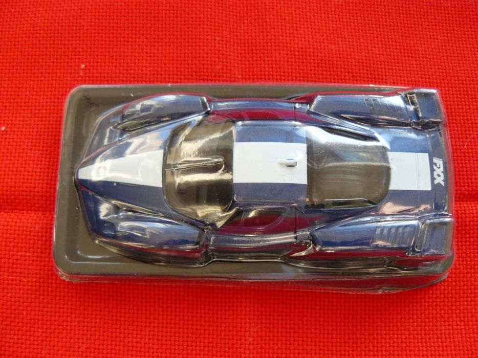 Macheta Auto FERRARI FXX Noua,Metalica,Scara 1:43,Produs De AmerCom