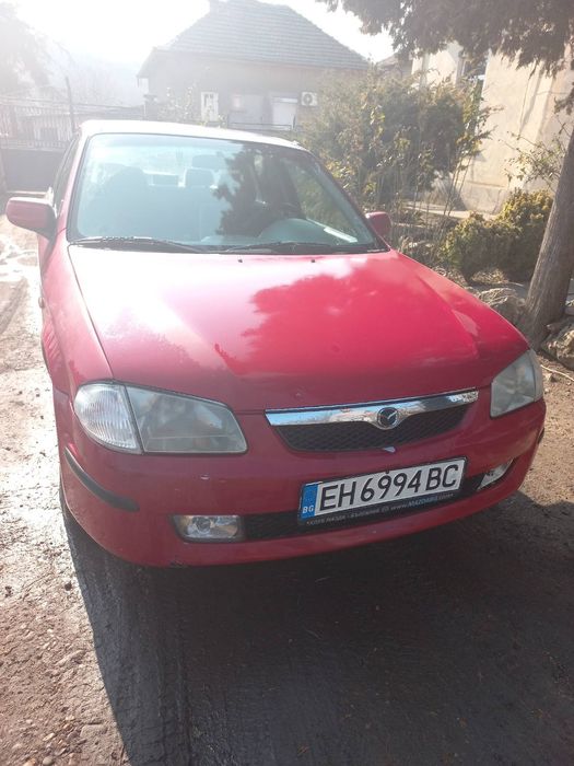 Мазда 323 90 к.с