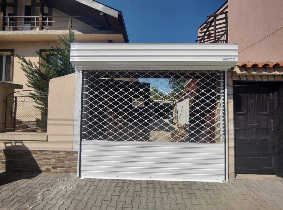 Охранителни ролетки и гаражни врати