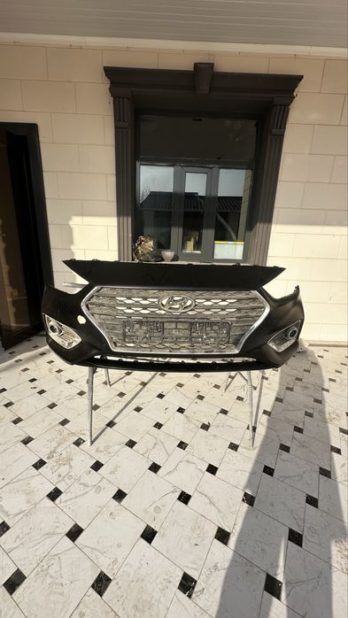 Передний бампер на Hyundai Accent