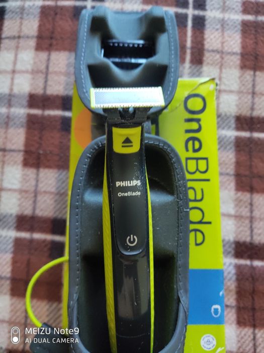 Срочно продам электробритву ,триммер новую