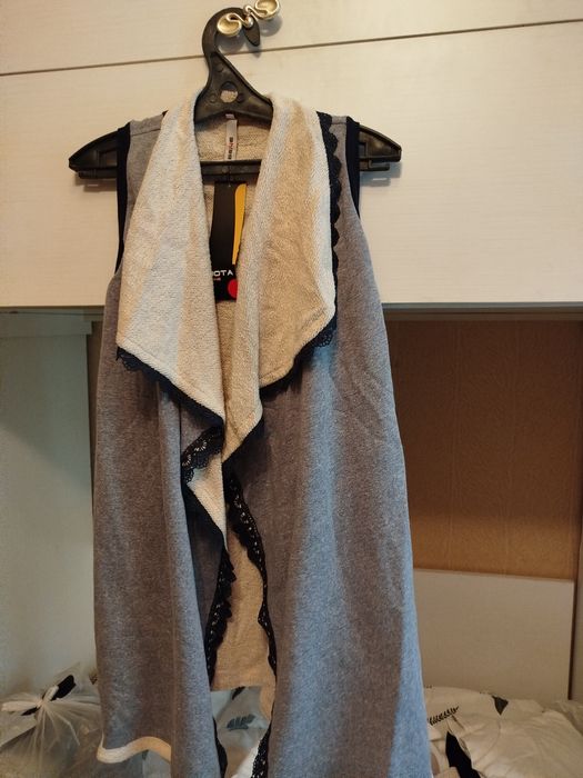 Продам жилет женский