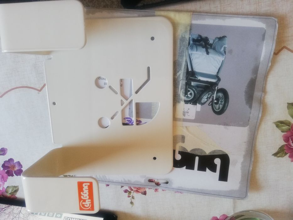 Suport metalic pentru carucior.