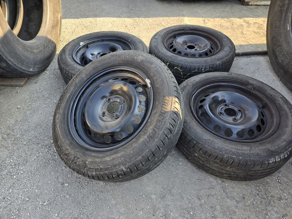 Jante 4x100 LOGAN - 185-65r15 de vara Bridgestone