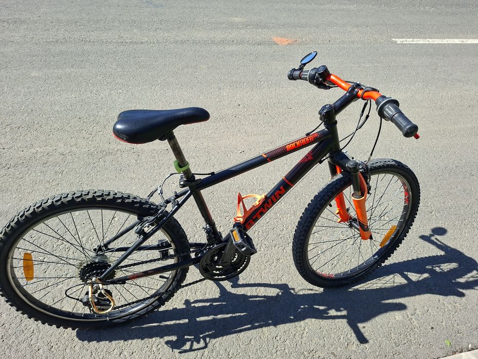 Vand bicicleta B-twin rockrider 500 pret 550 lei