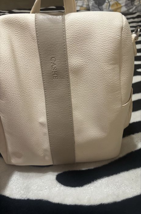 Дамска плетена  жилетка с раница