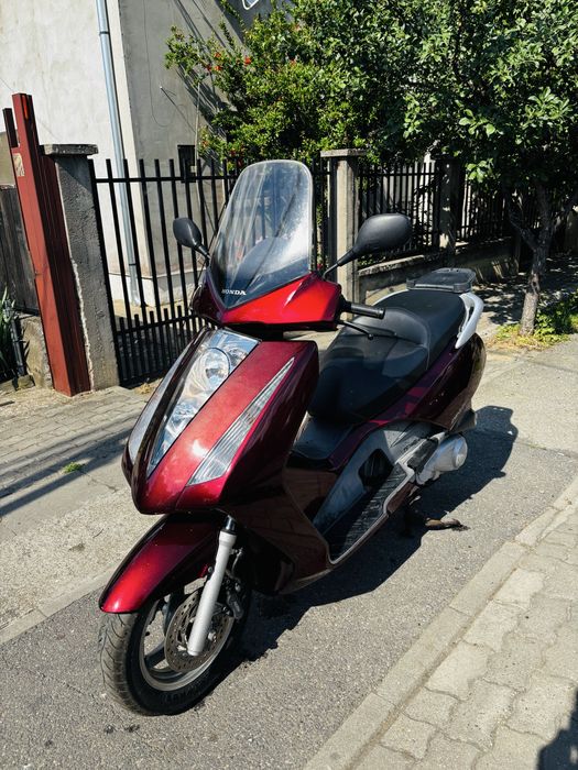 Honda pantheon 125 injectie