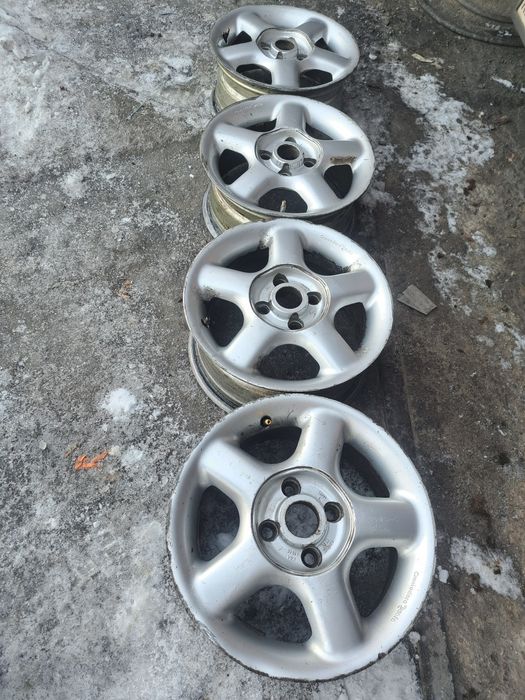 титанки р14  4/100 Passat golf