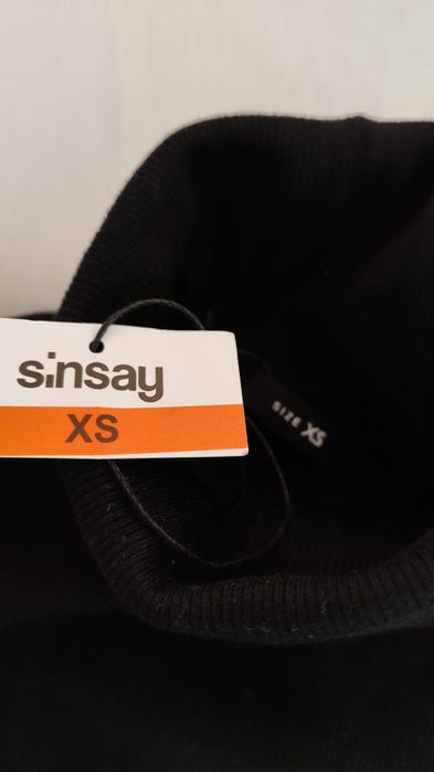 Поло рокля от Sinsay с регулируема част на врата