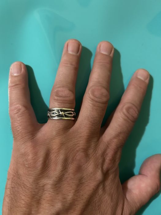 Inel bǎrbǎtesc de argint - model sârmǎ ghimpatǎ