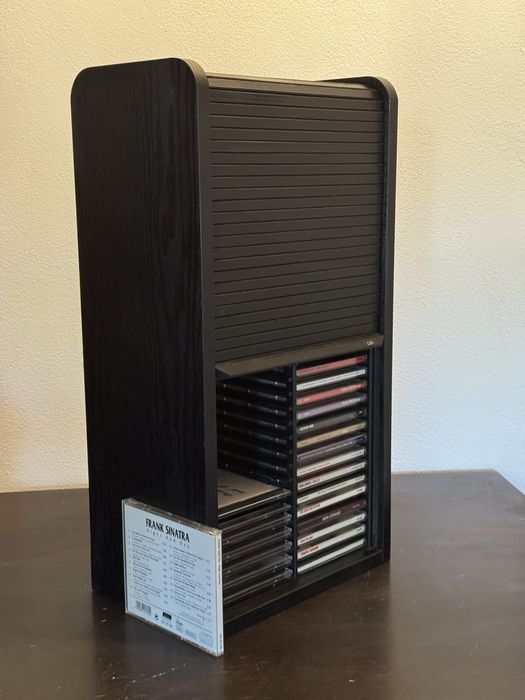 Vand suport CD-uri cu usa glisanta lamelara din lemn