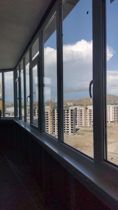 Пластиковые окна, двери и витражи