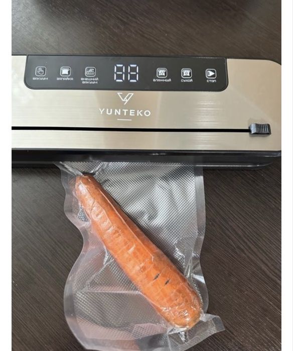 Вакуумный упаковщик