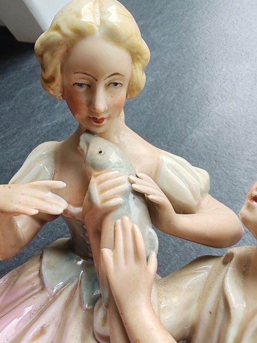 Bibelou antic german ,,Vânzătorul de peste"