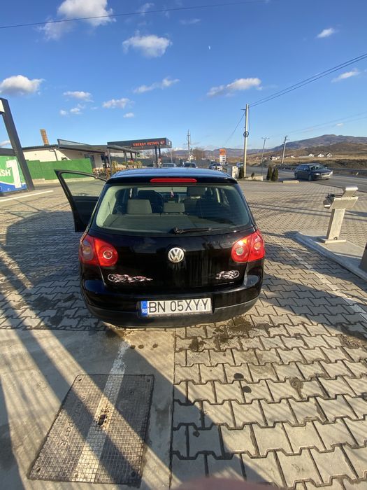 Vand golf 5 gri , cu cutie manuala