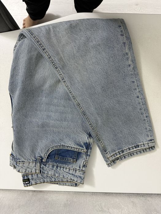 джинсы Tapered fit