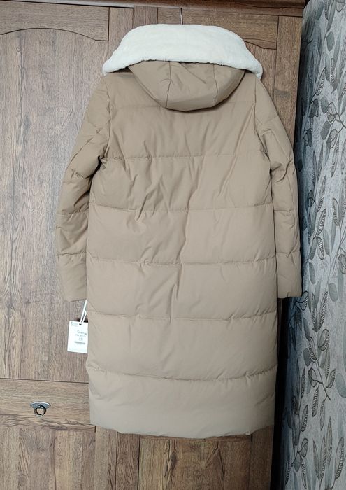 Новый пуховик 48 размера