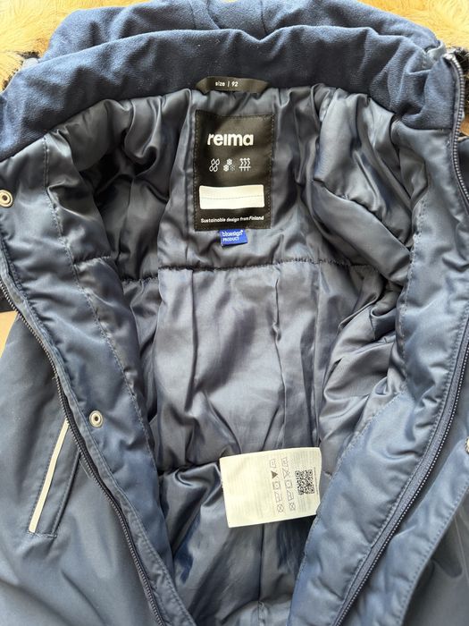 Продам зимний комбинезон Reima